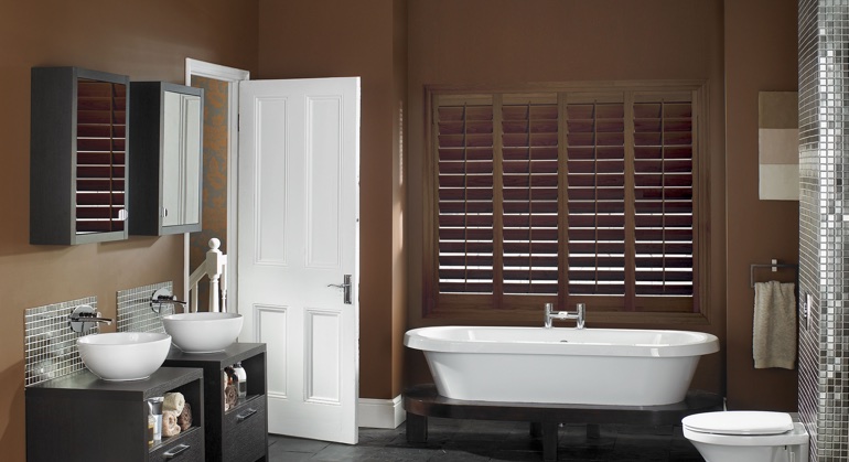 Stained wood shutter in Denver restroom